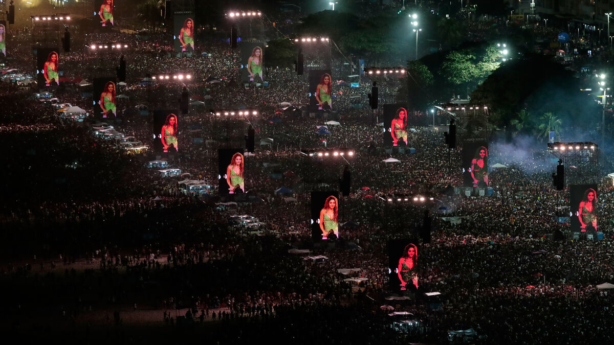 Shakira performs on stage before millions in Rio de Janeiro