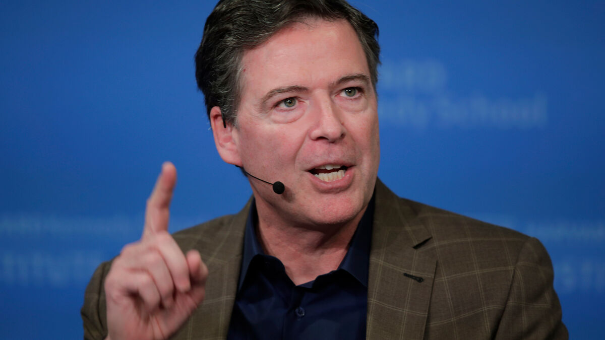 Former FBI director James Comey surrenders to court