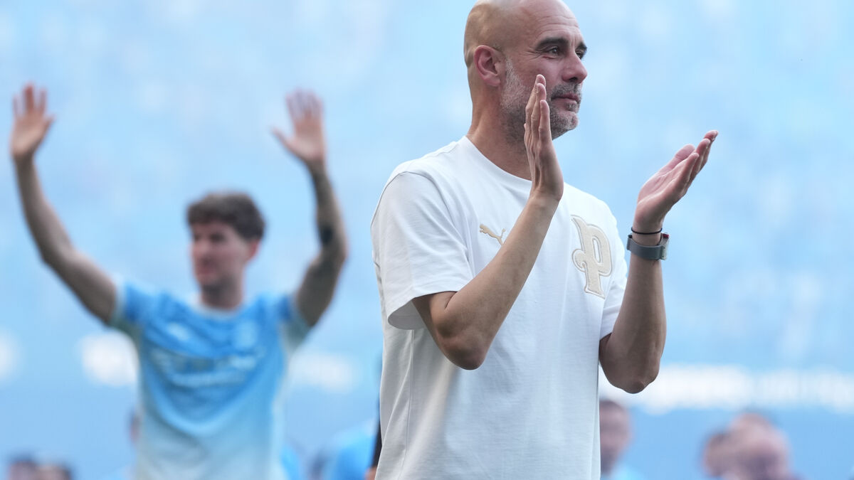 Manchester City auction off Guardiola's office chair, jacket and whistle for charity