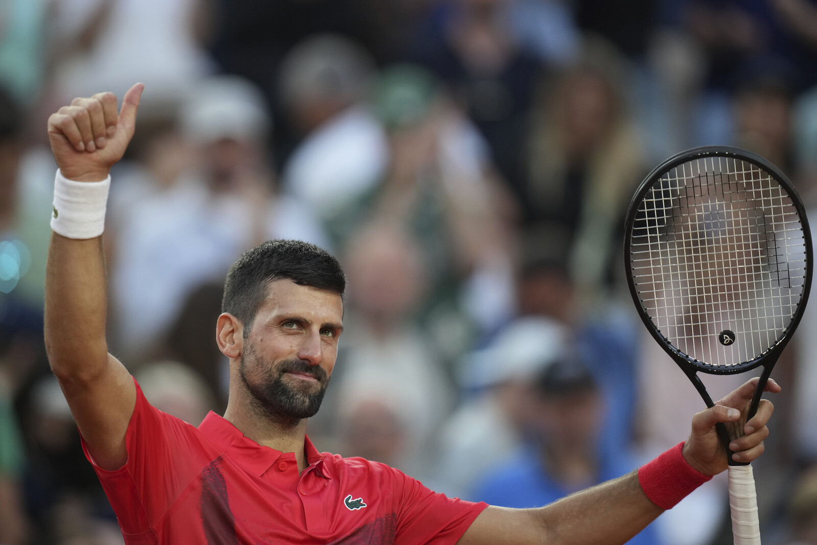 Djokovic Energized by Paris Bike Ride Advances to Third Round