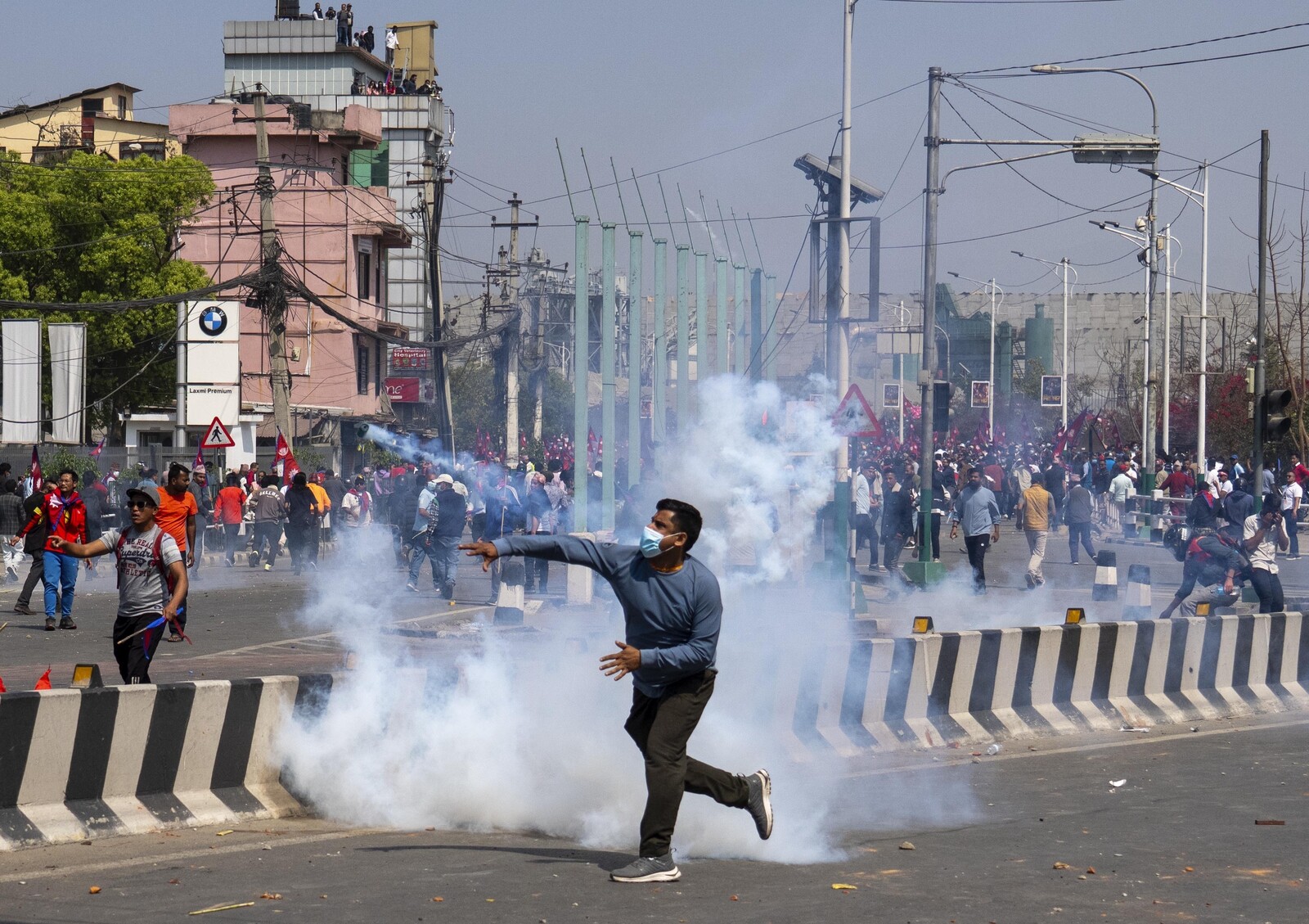 Two Dead, 105 Arrested in