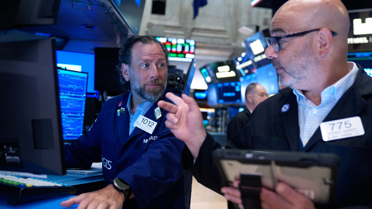 Wall Street rebounds as chip stocks lead gains