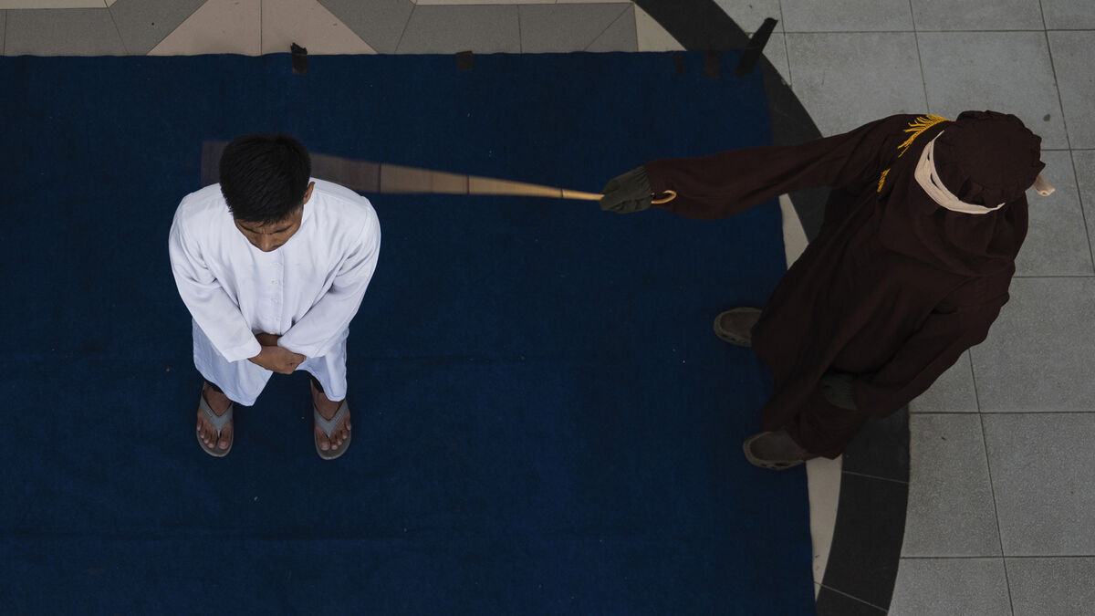 Couple sentenced to caning for