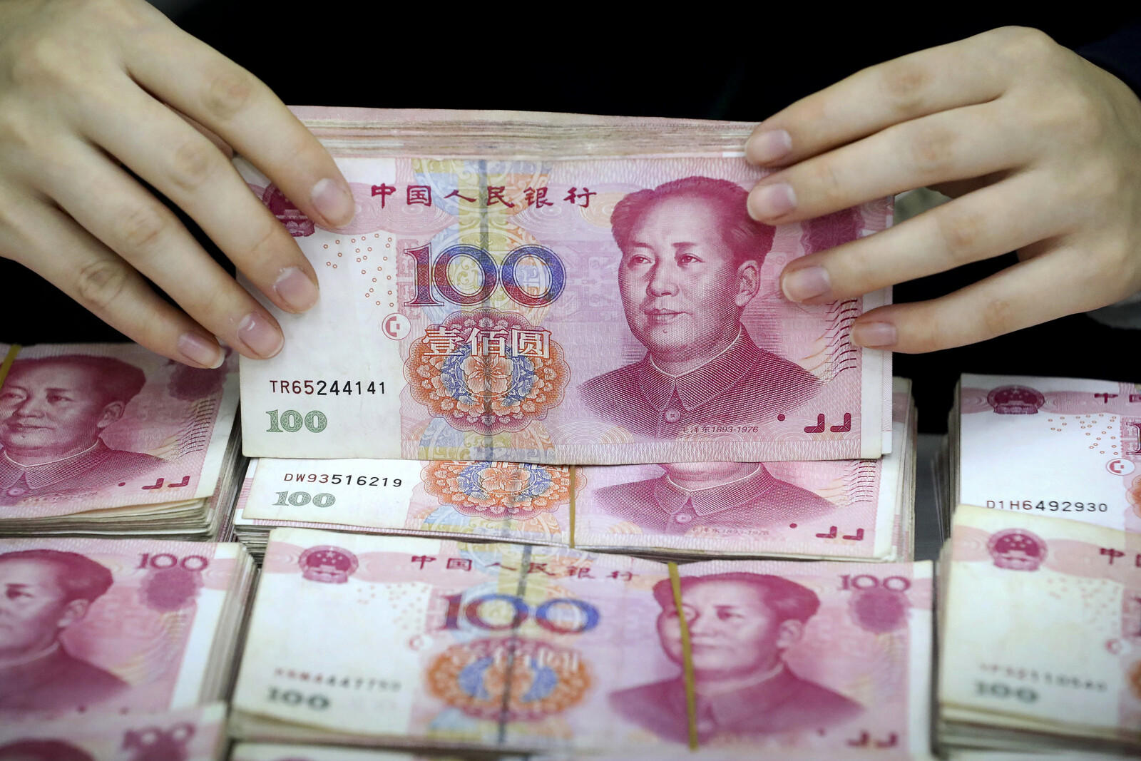 Fitch Downgrades China's Credit Rating Citing Economic Concerns