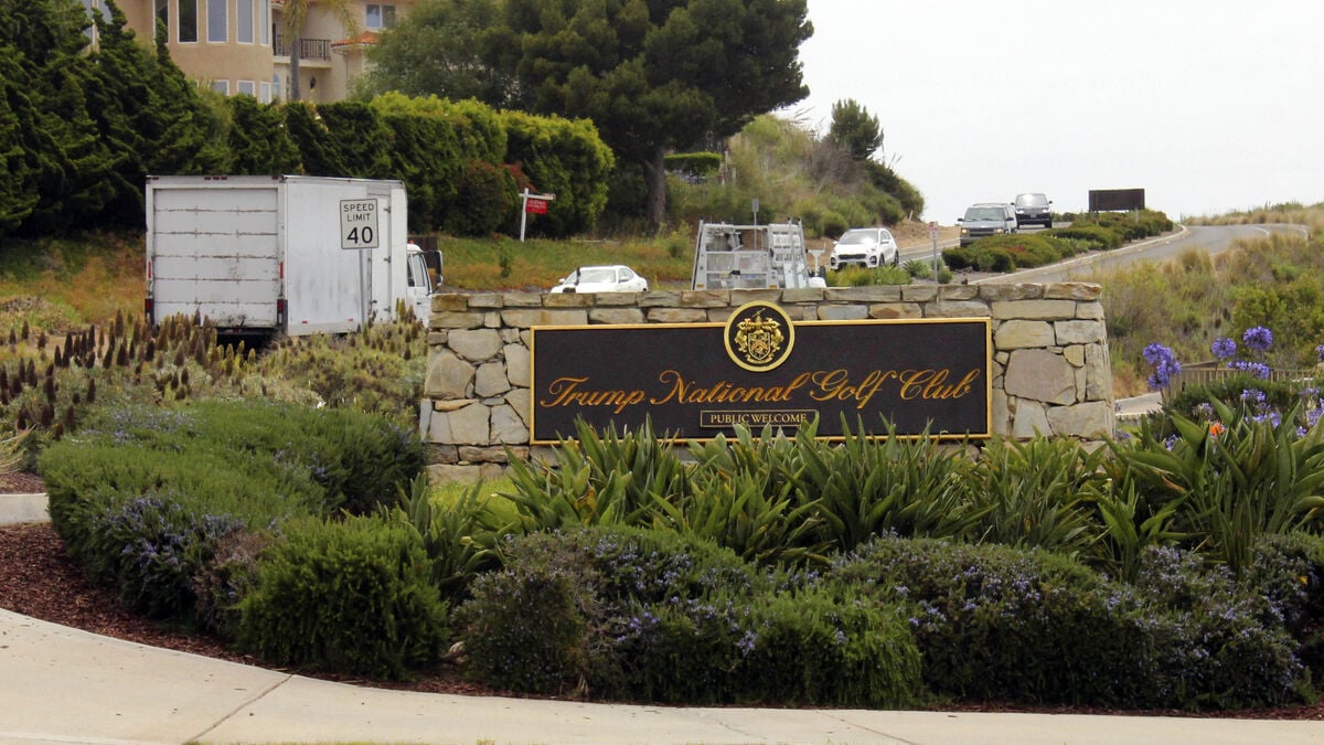 Man arrested at Trump golf course over security photos, ammunition found in car