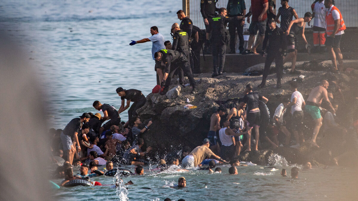 Spain says most migrants who