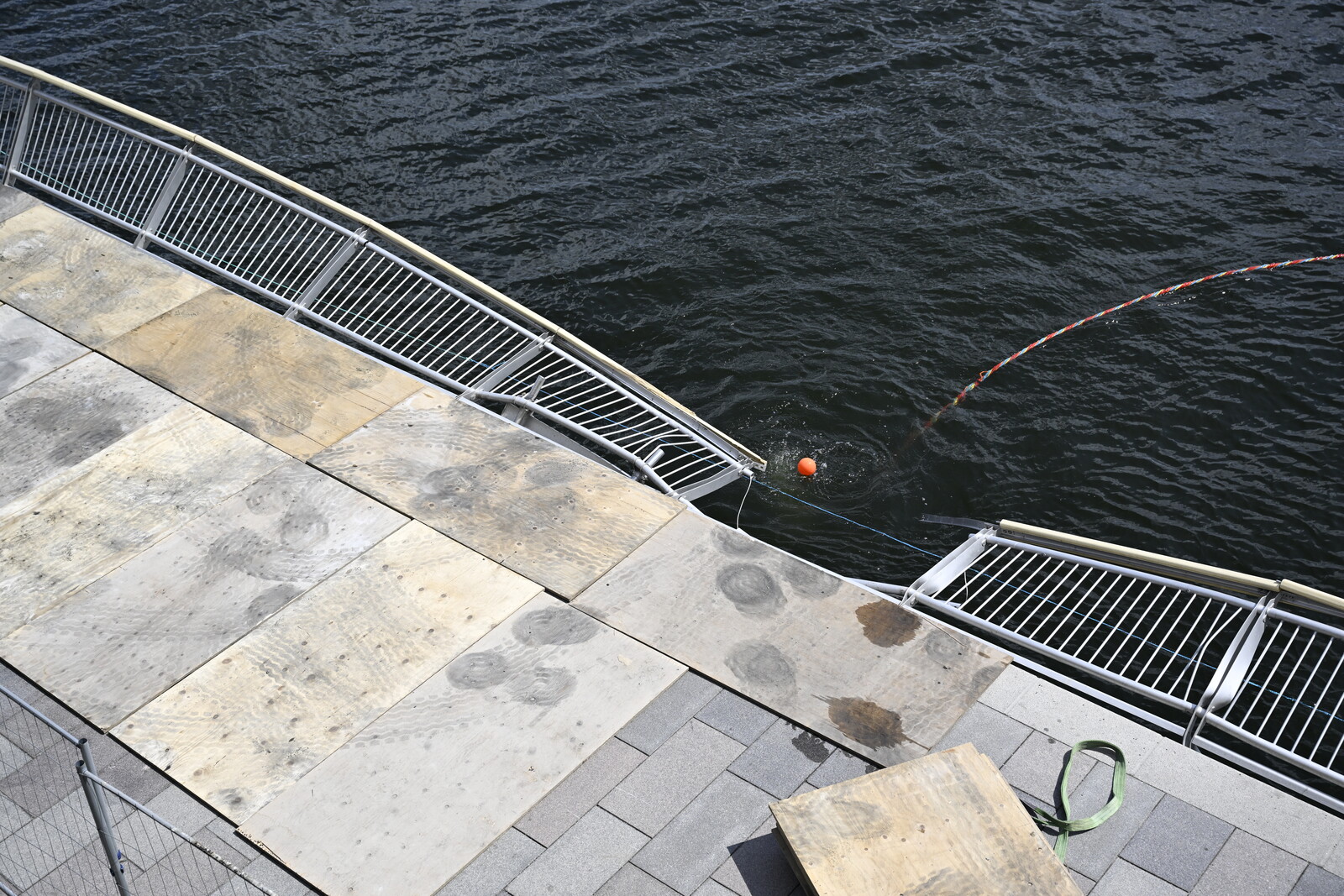 Crane Overturns in Stockholm, Person Falls into Water