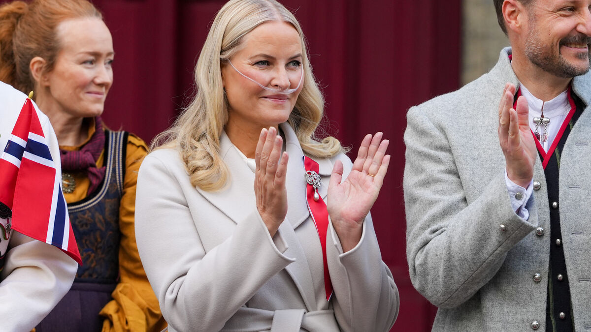 Crown Princess Mette-Marit receives oxygen during May 17 celebrations