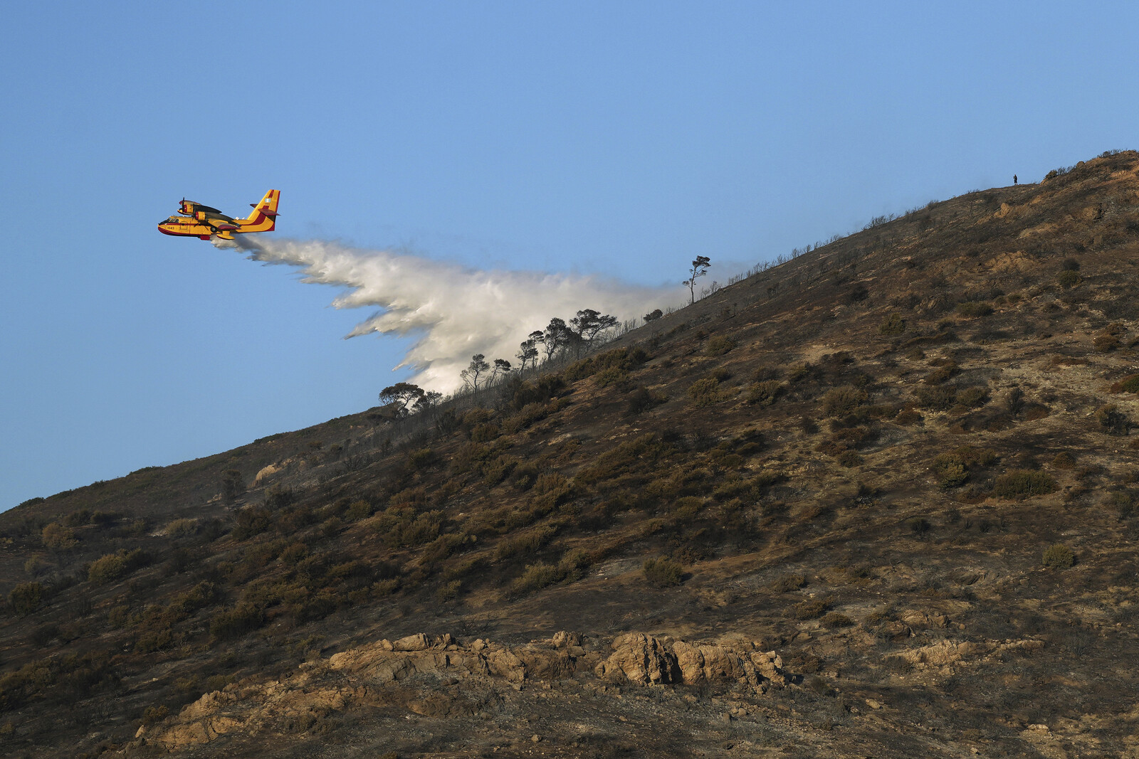 Wind Hampers Firefighting as Wildfires