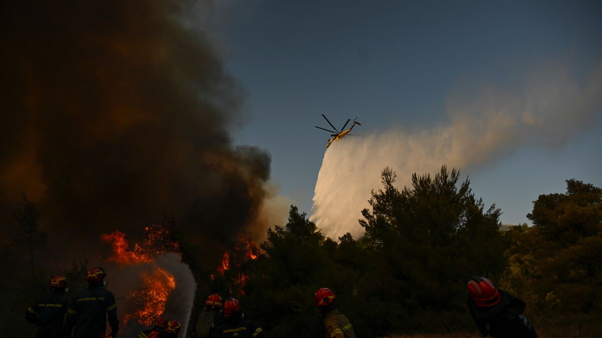 Two firefighting helicopters collide in