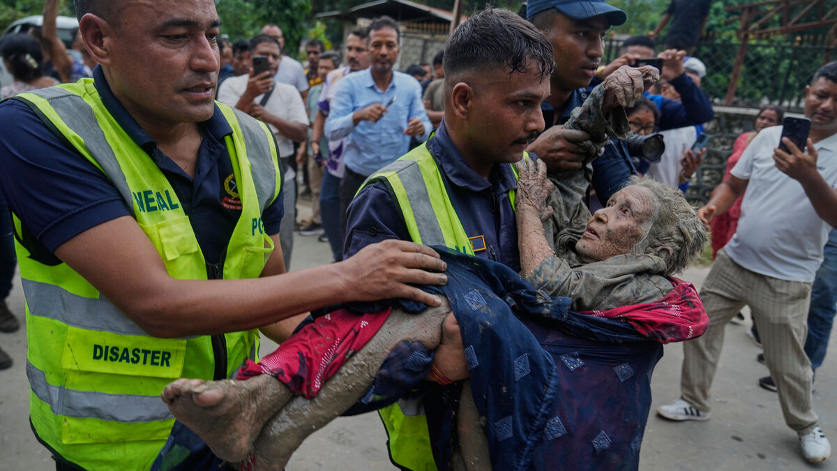 Flash floods and landslides in the Himalayas kill at least 160, hundreds missing