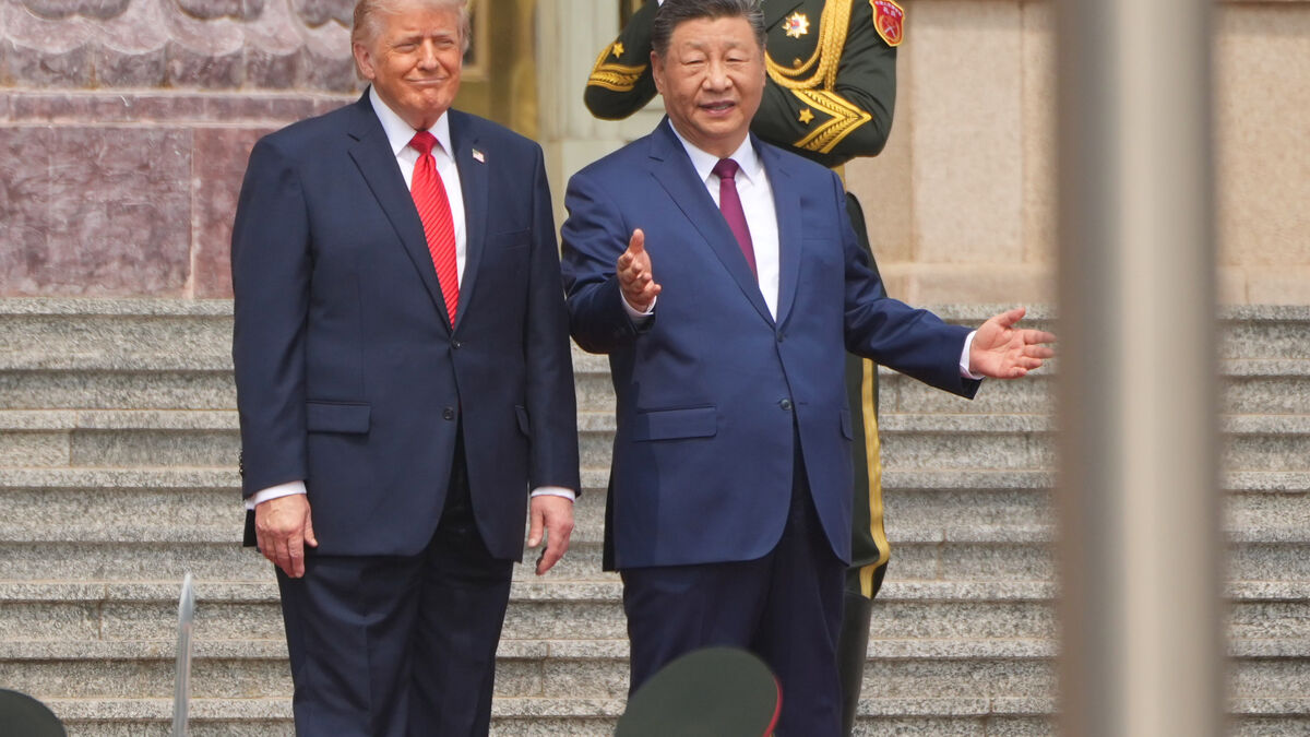 Asian stock markets mixed during Trump and Xi summit in Beijing