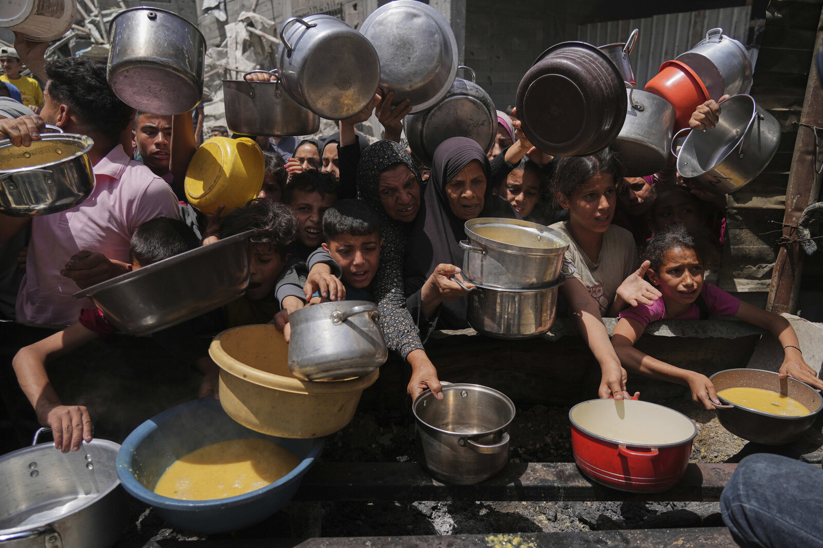 Israel's Gaza Aid Strategy Criticized for Using Food as a Weapon