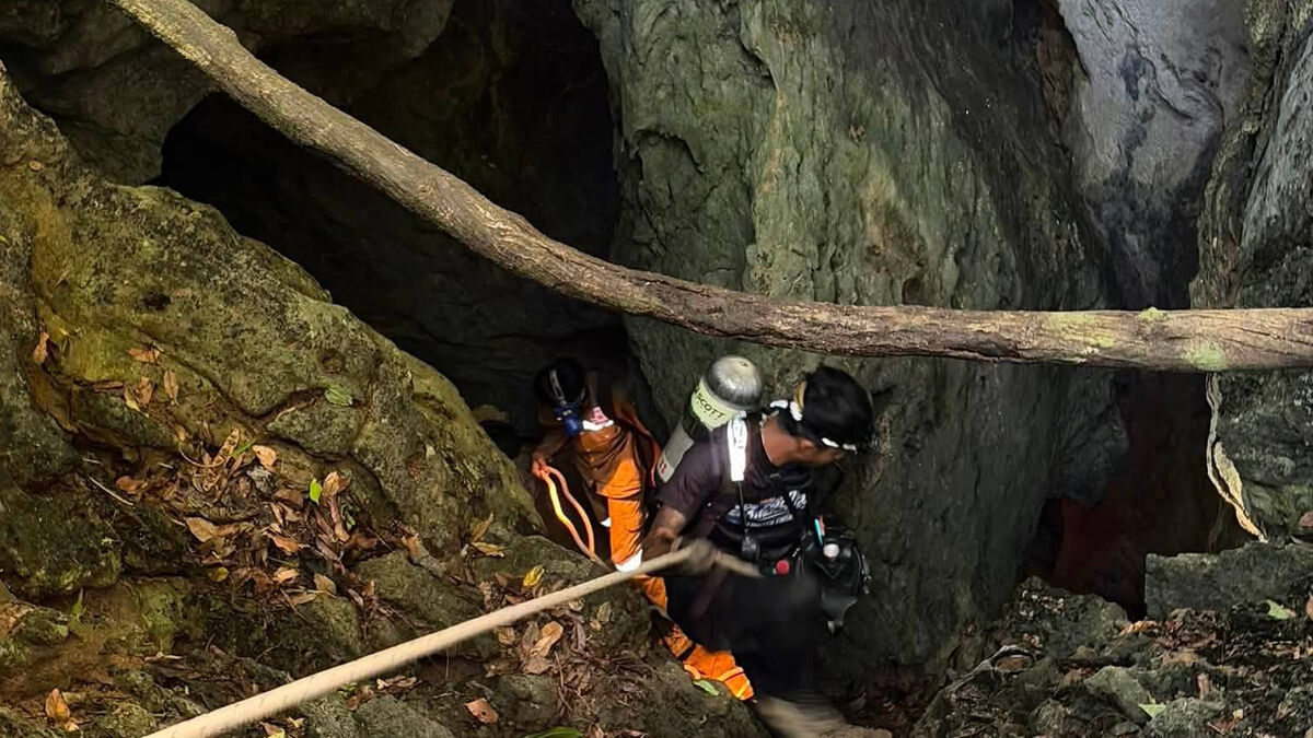 Five of seven found alive in flooded cave in Laos, rescue worker says I'm still shaking