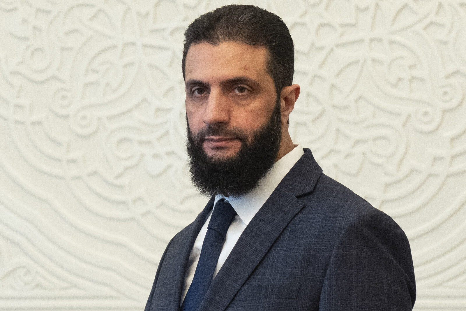 Syria's leader: It may take four years to organize elections