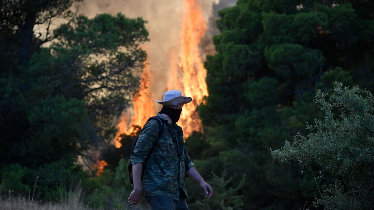 New fires threaten area around