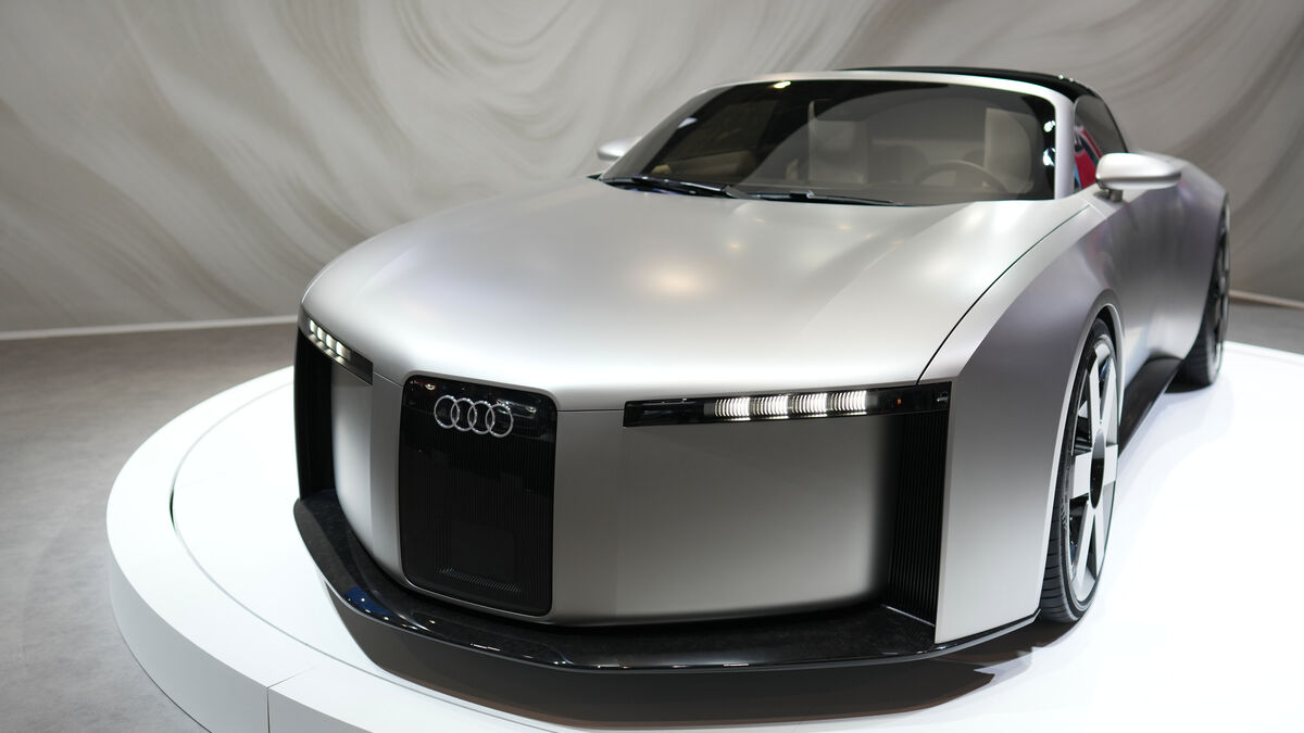 Audi lowers full-year forecast as