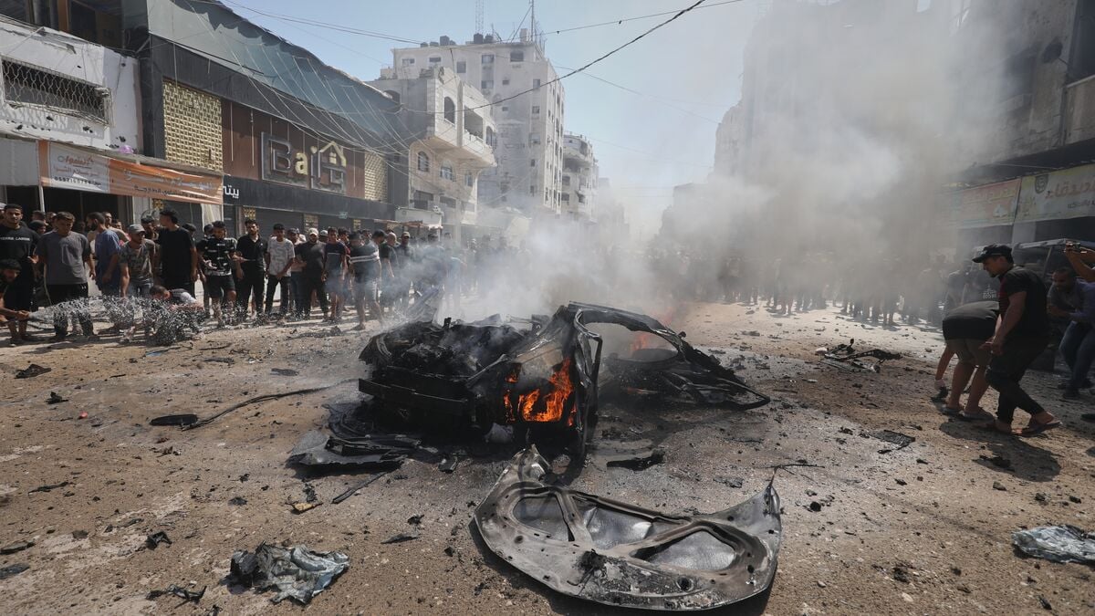 Israeli airstrikes hit car and residential building in Gaza City, killing at least 5