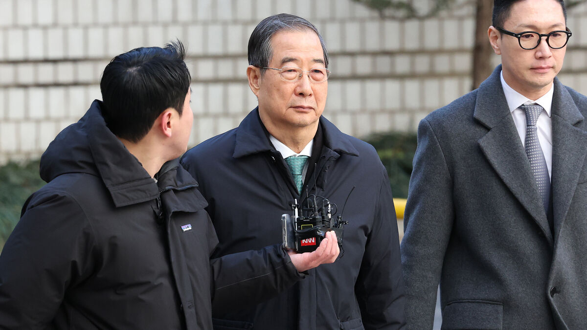 Former prime minister Han Duck-Soo gets reduced sentence to 15 years after appeal