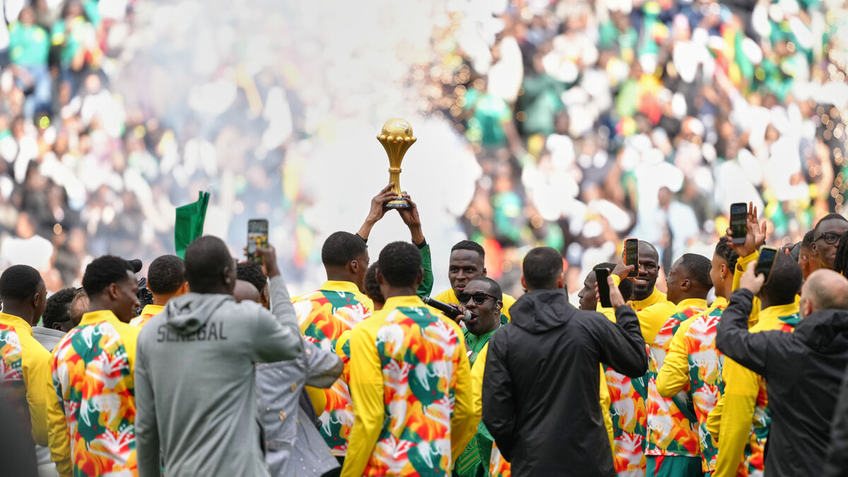Senegal celebrates with their lost trophy