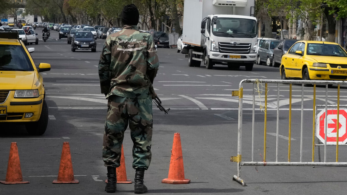 Iran's militia recruits children to