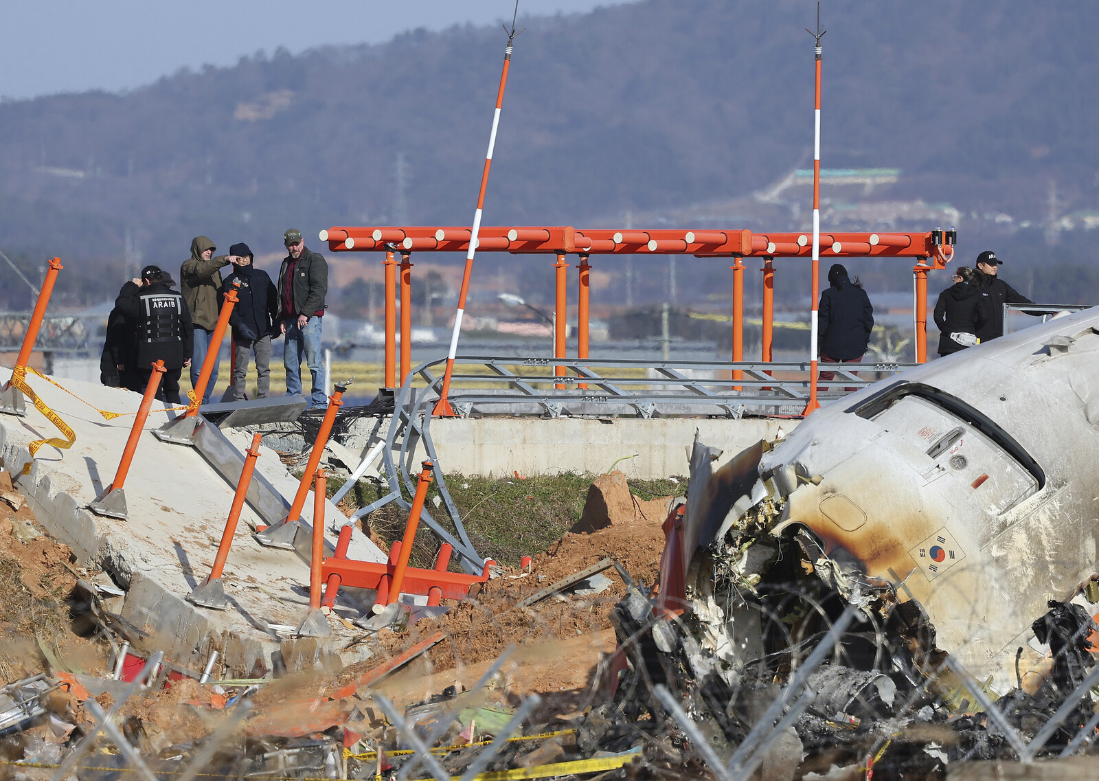 After the Crash: Minister Defends Criticized Wall