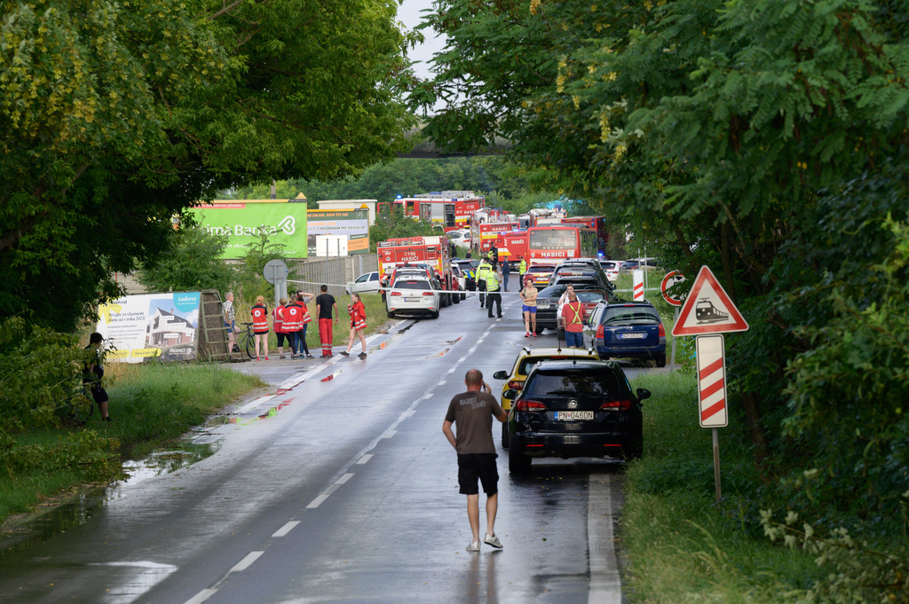 Multiple fatalities after train collides with bus