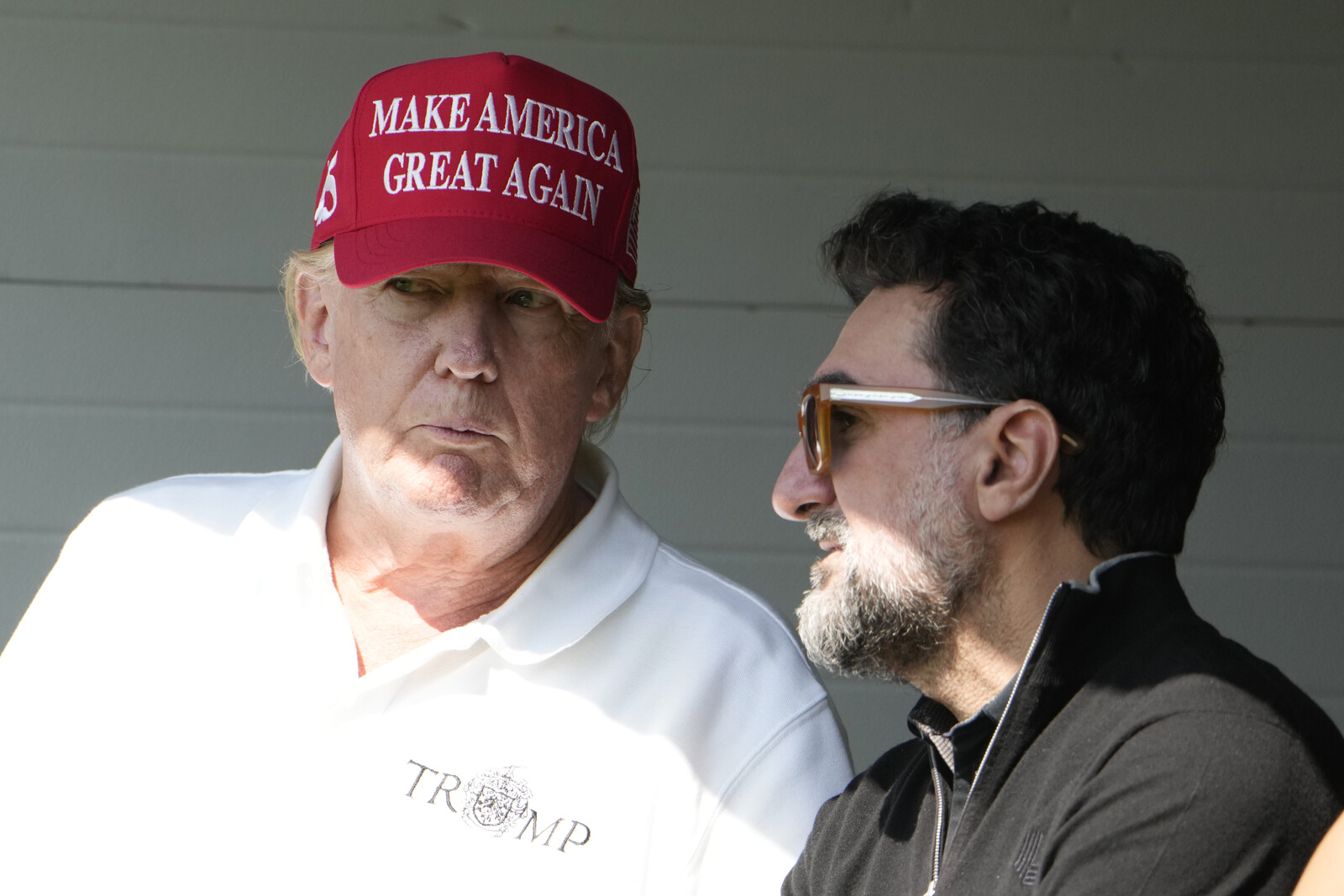 Trump played with Woods - to resolve the conflict
