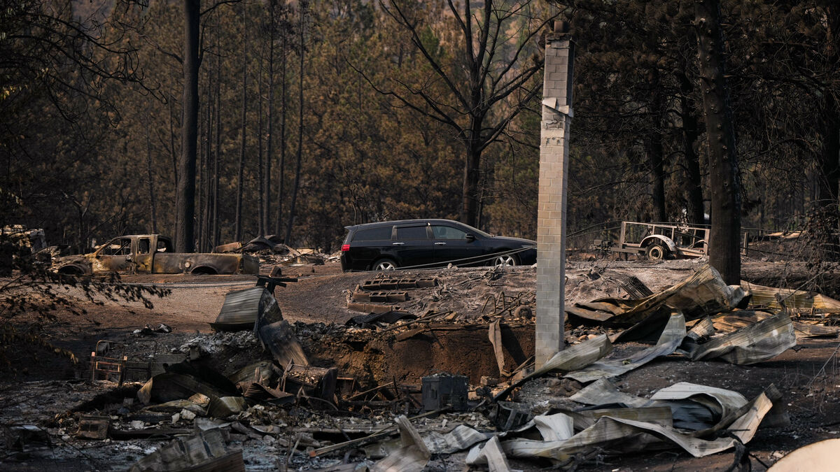 More than 20,000 evacuated as wildfire grows in western Canada