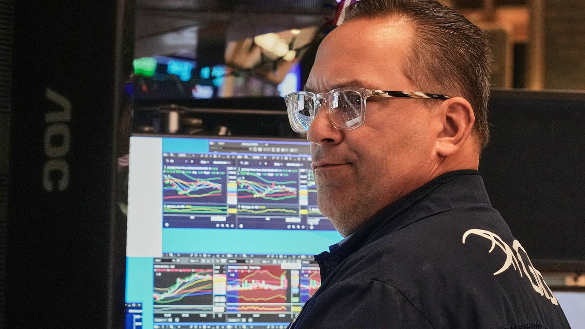 New records on Wall Street as Apple rises after its quarterly report