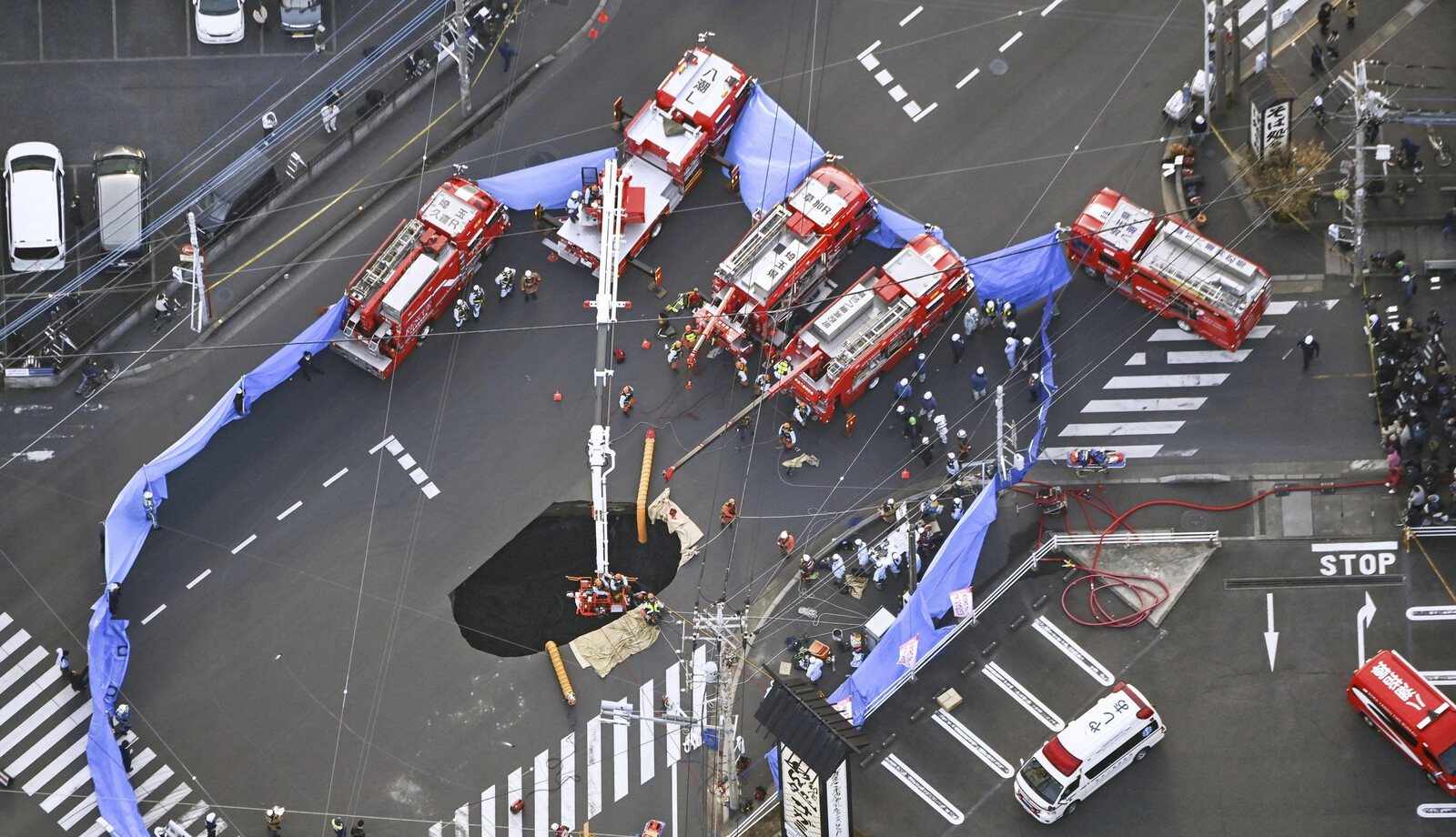 74-year-old stuck in sinkhole for