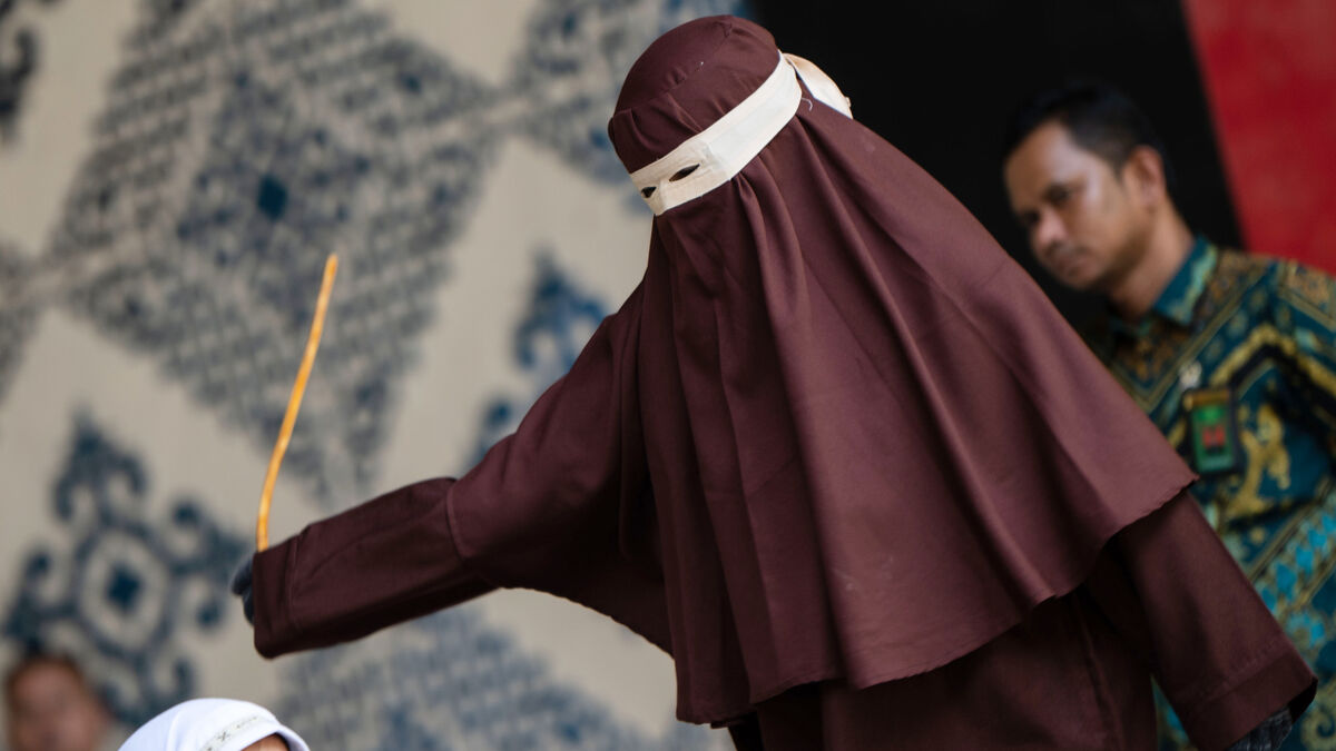 Indonesian couple publicly caned for