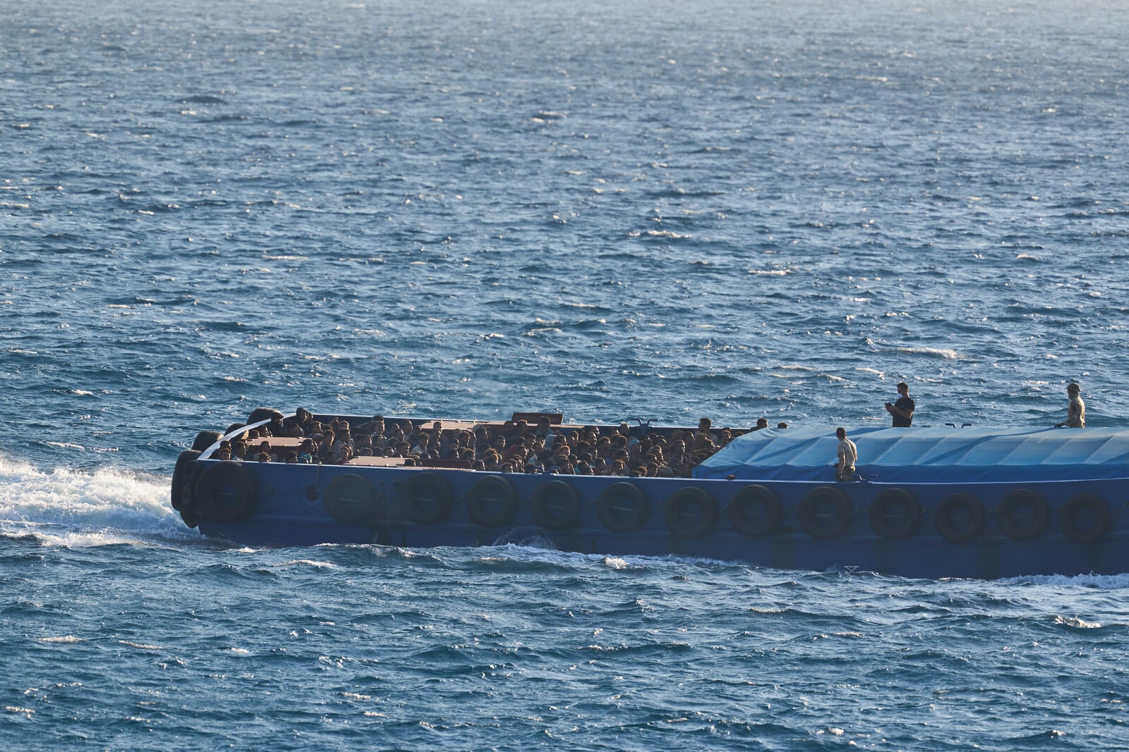 Greece Detains Migrants Amid Temporary