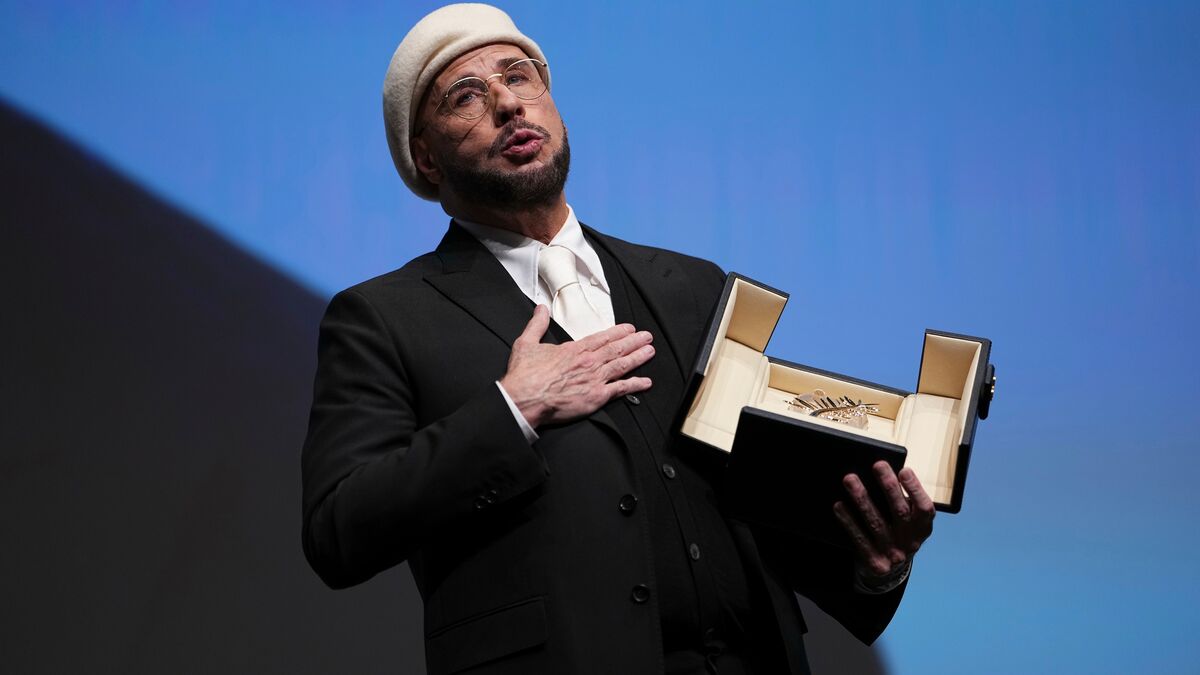 John Travolta surprised with honorary Palme d'Or at Cannes