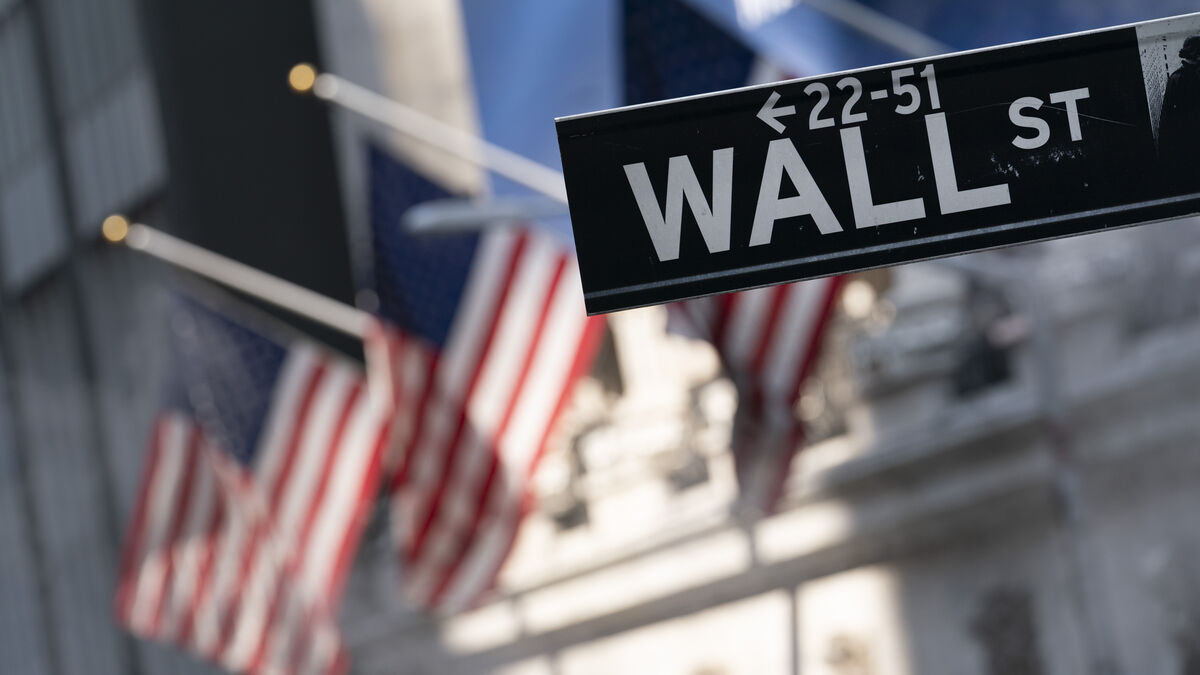 Wall Street falls as chip stocks rise, Alphabet gains on new AI chip report