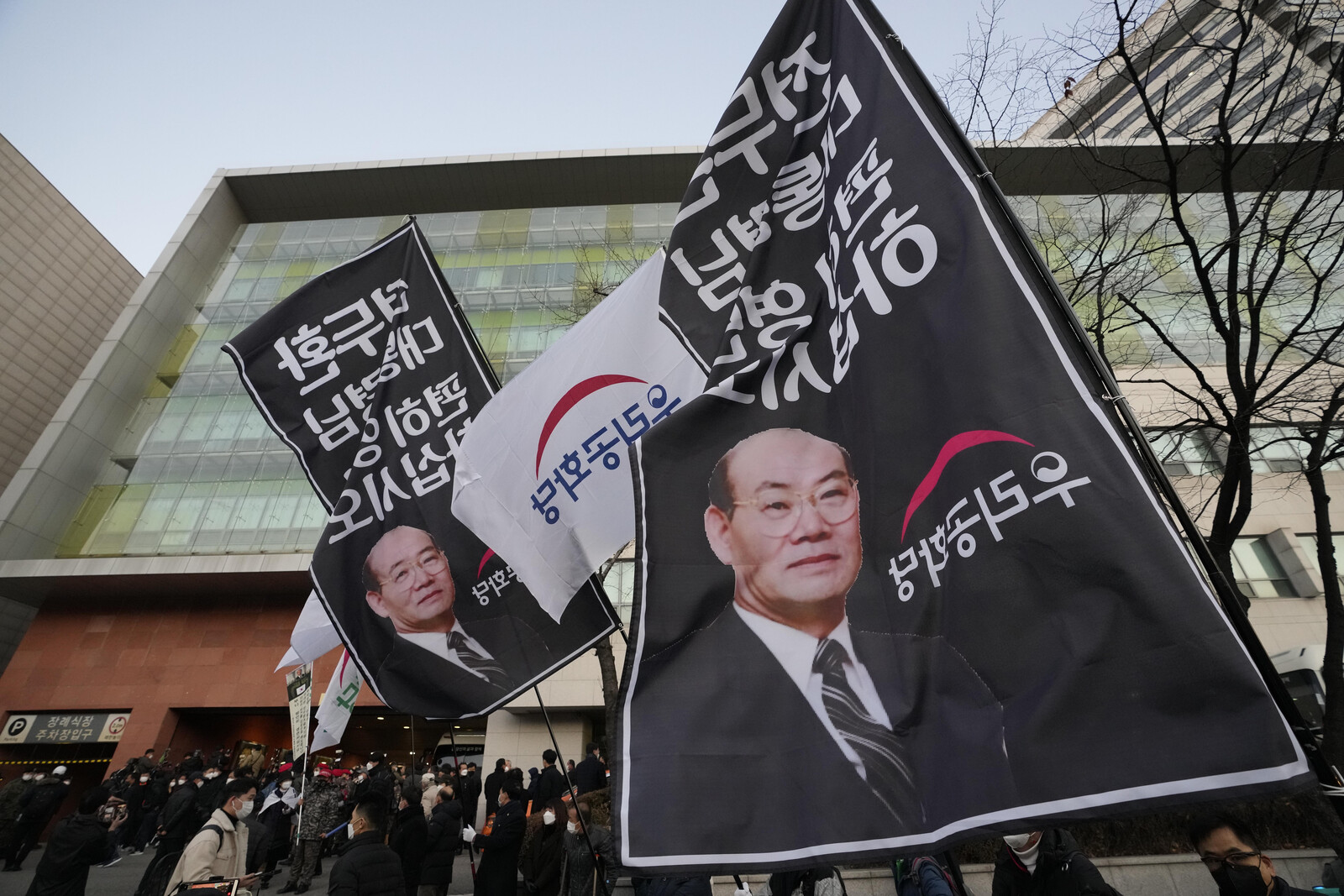 Mocked with pictures of ex-dictator
