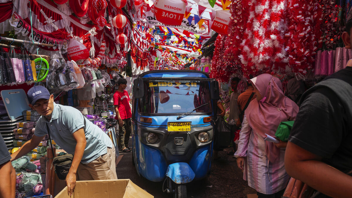 Indonesia's central bank raises key interest rate for third time in a month to 5.75 percent