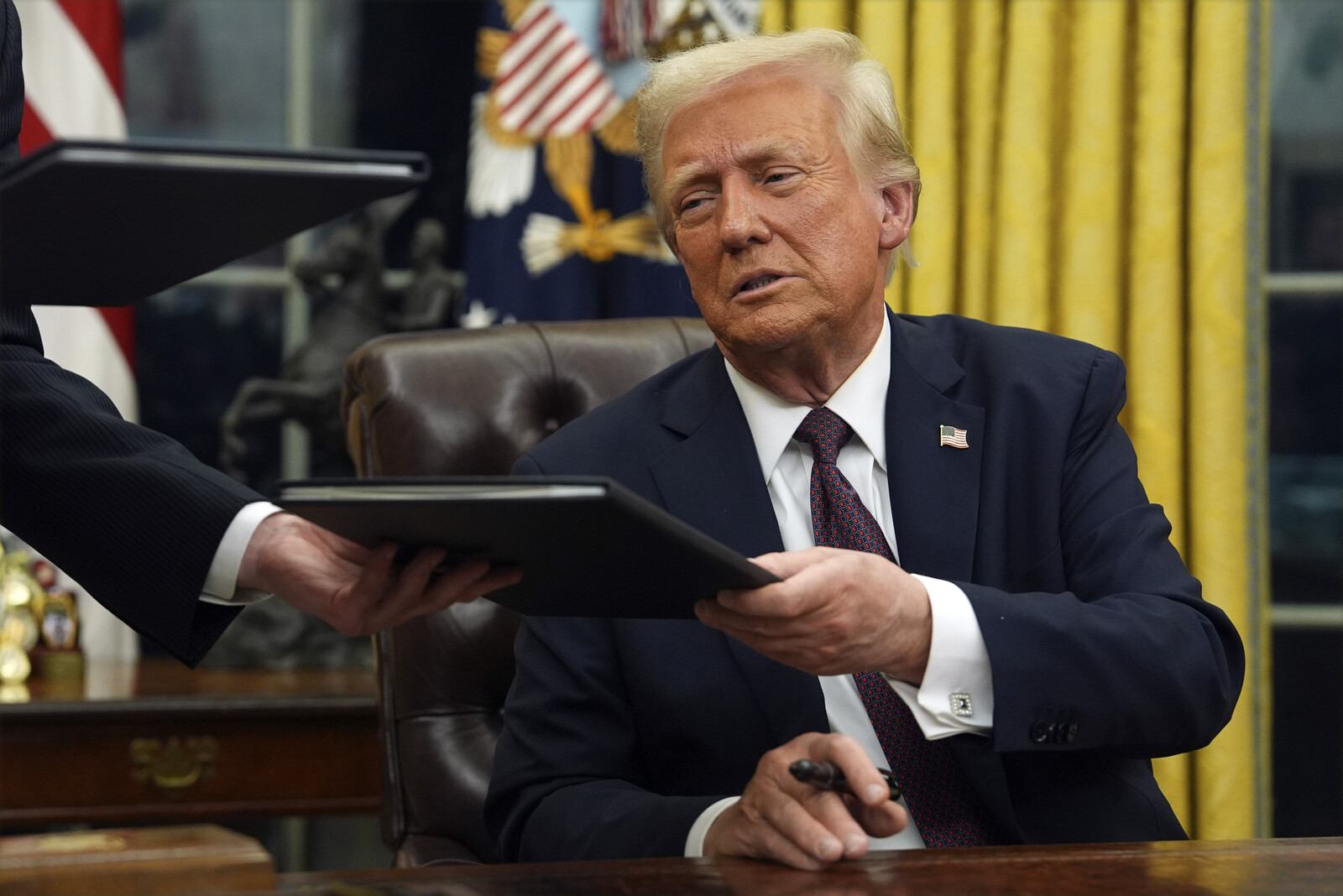 Trump pardons convicted individuals for