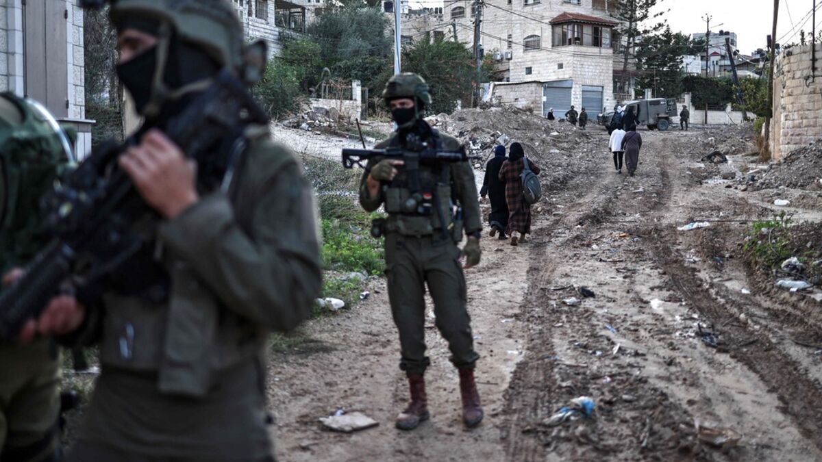 Palestinians shot with their hands