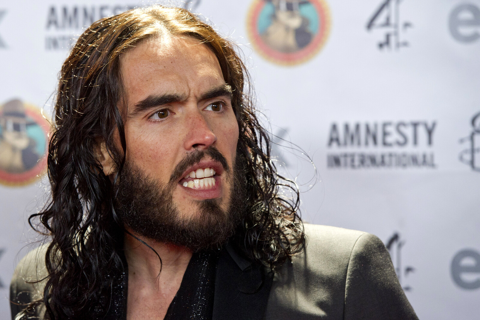 Russell Brand Faces Rape and