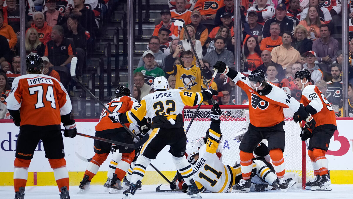 Hållander stars as Penguins rout