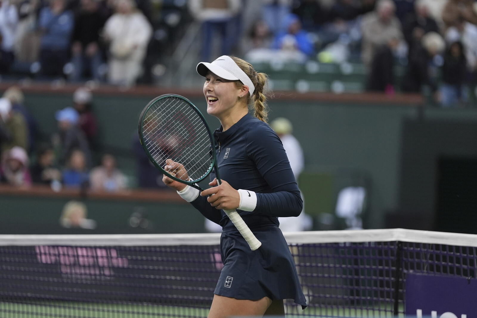 Teenager knocks out world number two