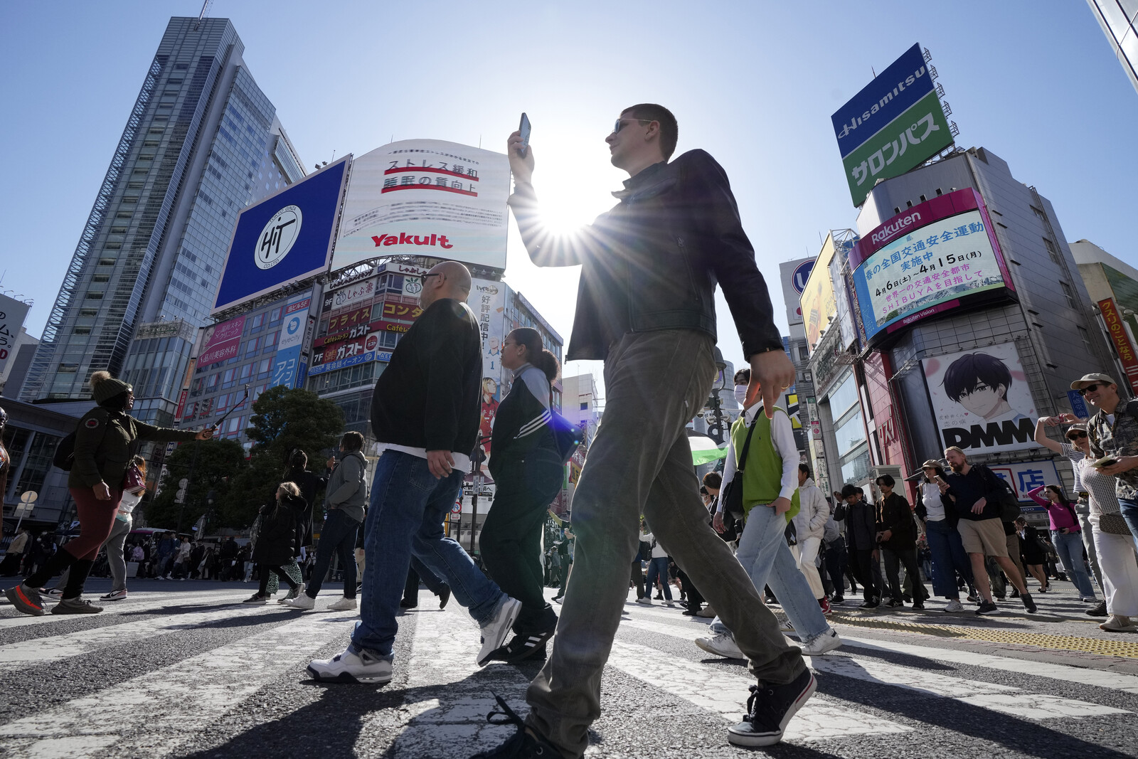 Tokyo and Hong Kong Stocks Rebound After Monday's Decline