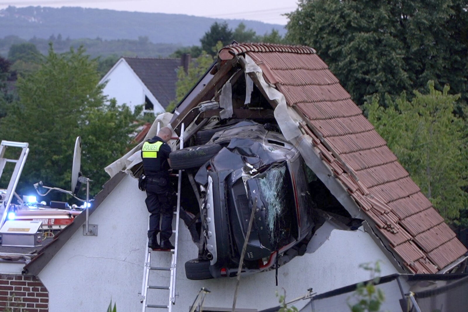 Car Crashes into Roof in