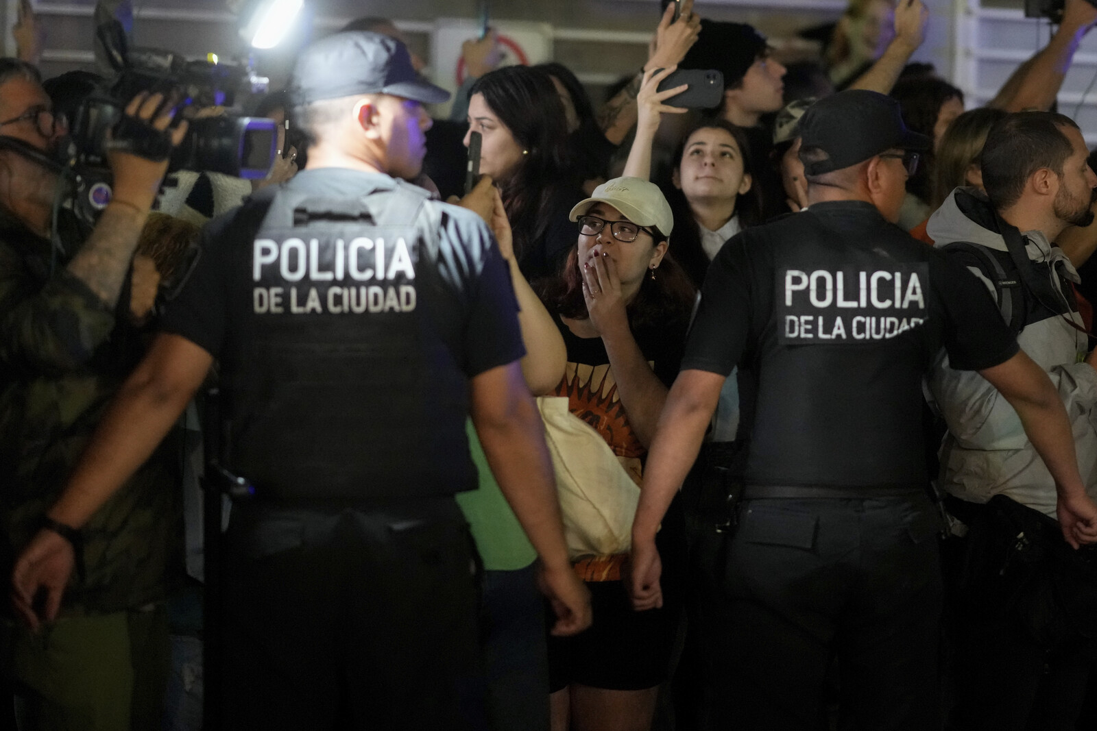 Shocked fans gather outside Payne's hotel
