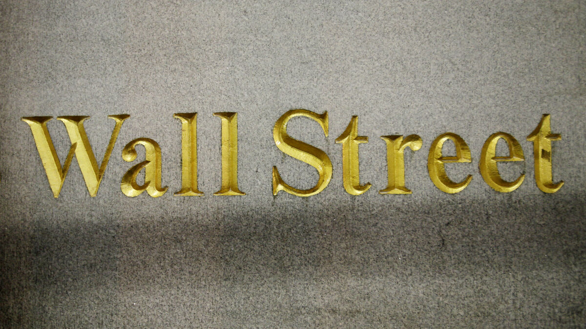 Wall Street mostly higher after cooler-than-expected inflation data, IBM shares tumble 25%