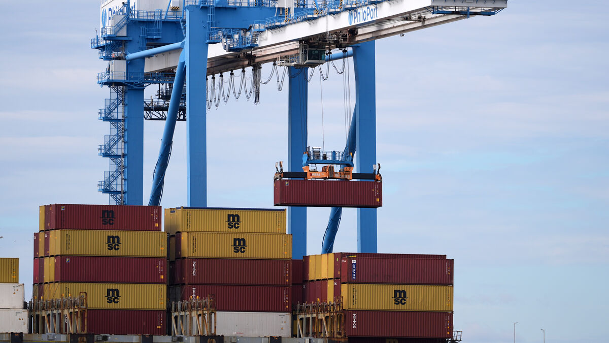 US trade deficit swells again to nearly $57 billion in November